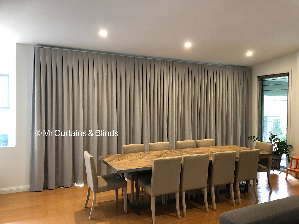 Beautiful pleated curtains on a sleek platinum track Erina Heights